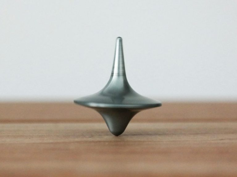 Toupie hypnotique Toupie évoquant inception et le pouvoir de l'inconscient